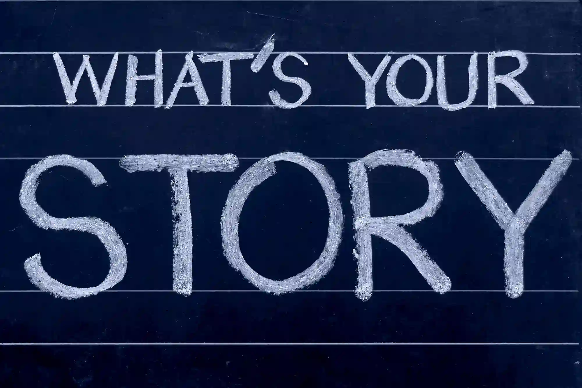 What’s Your Story written in chalk